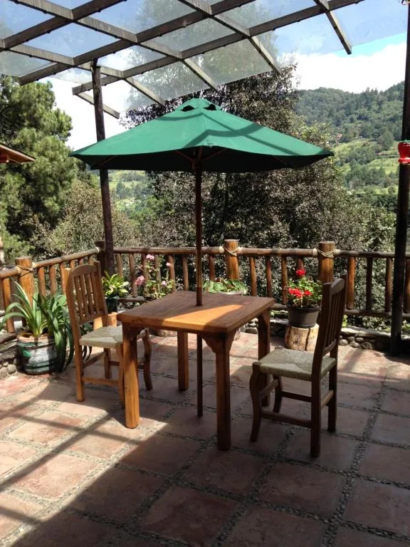 Terrace overlooking the green hills of La Marquesa